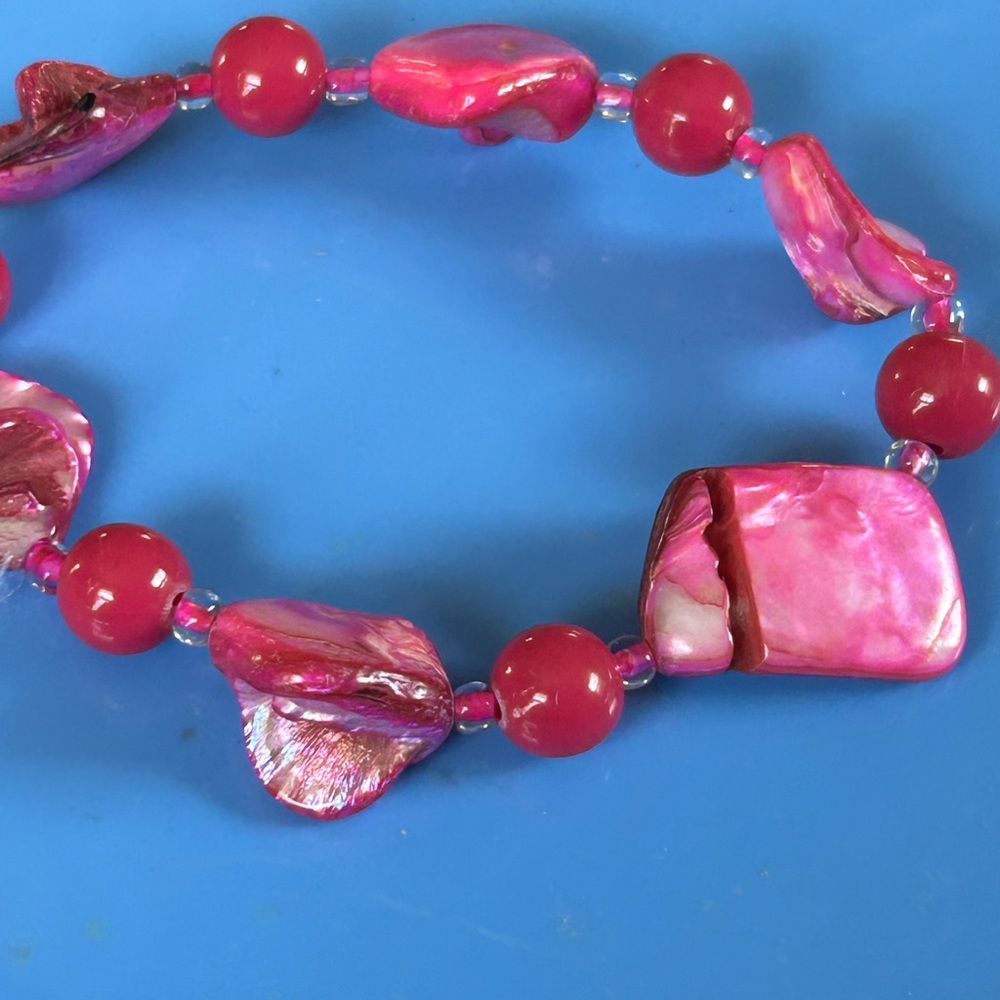 Pink beaded bracelet with rock shaped beads